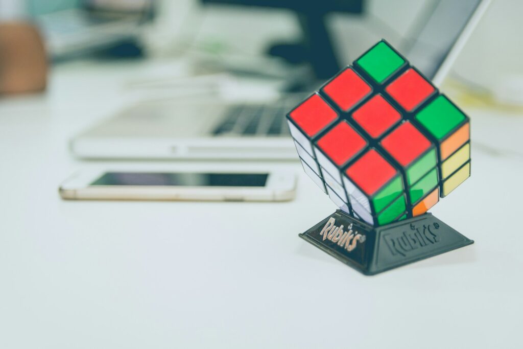 3x3 rubik's cube on top of desk