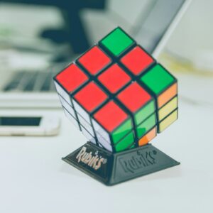 3x3 rubik's cube on top of desk